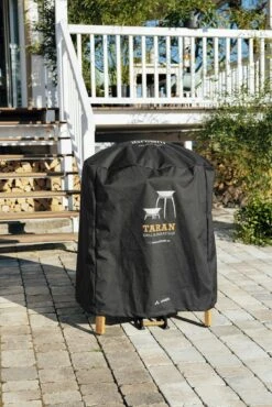 IGNIUM Abdeckhaube Schwarz Vaude -Weber Verkäufe TARAN Grill Abdeckhaube Moodbild Hersteller Ignium